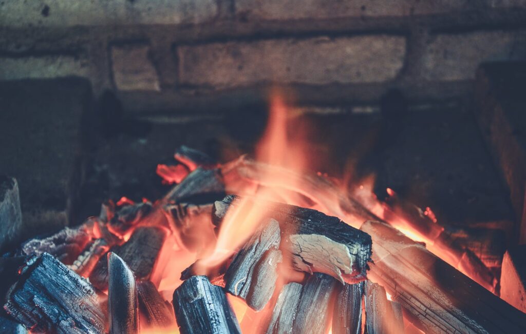flaming charcoal closeup photography